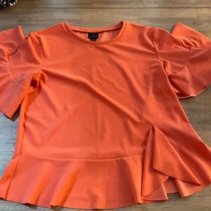 Detailed and flowy top!